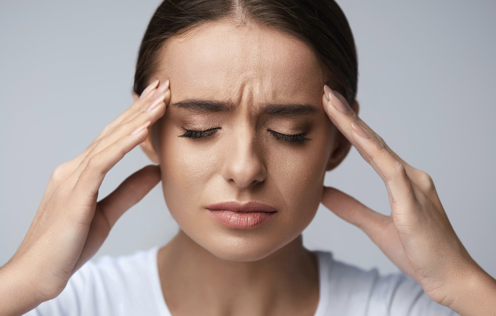 woman dealing with pain from bruxism