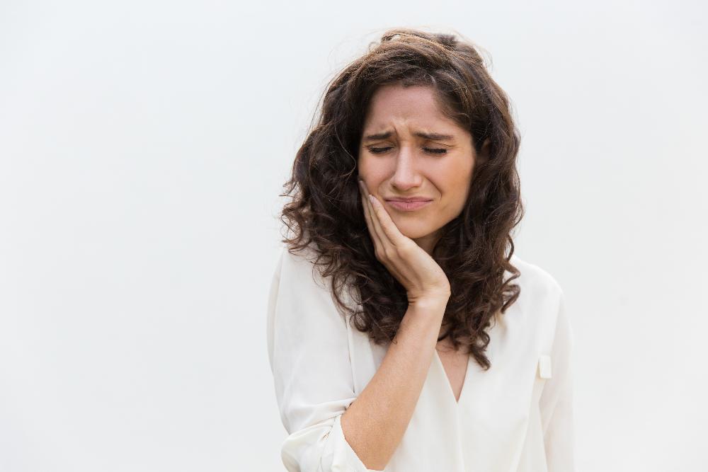 woman with toothache needing an emergency dentist in prahran