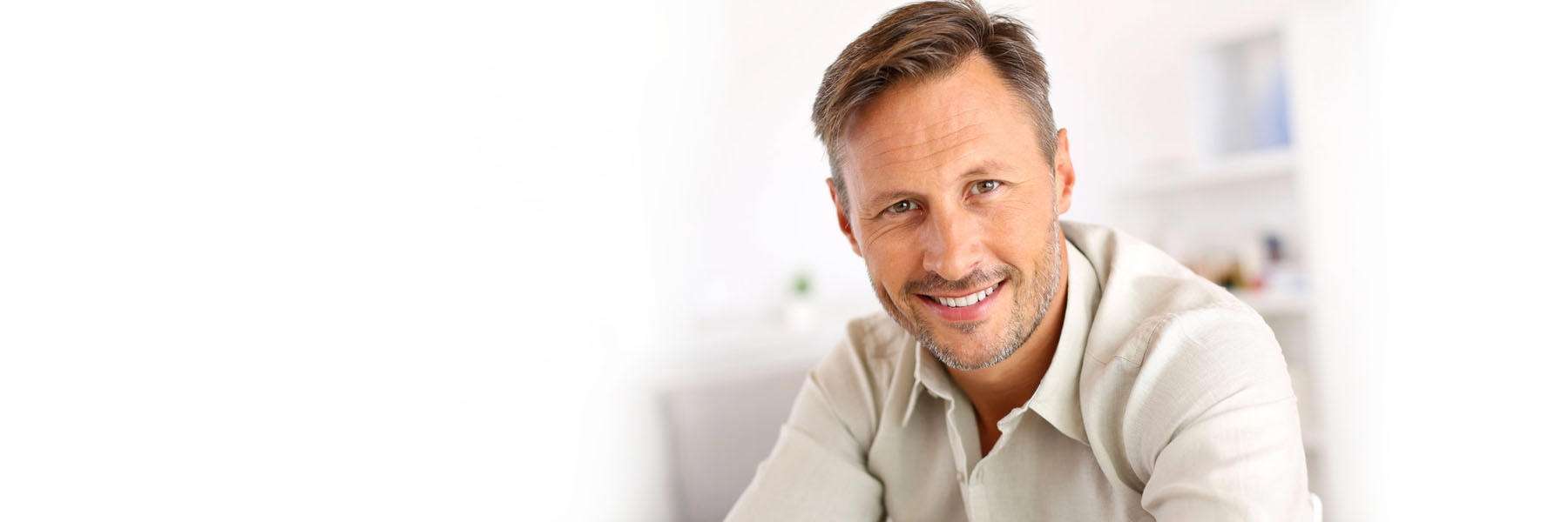 man with dental crowns in prahan