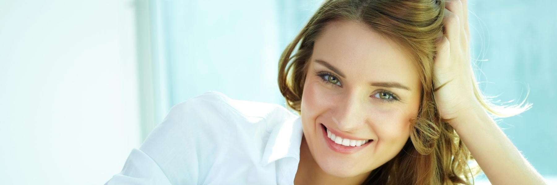 patient smiling after receiving bruxism treatment in prahran