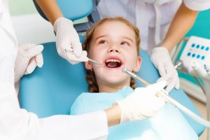 Female child in the dentist chair