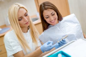 Dentist and patient in consultation